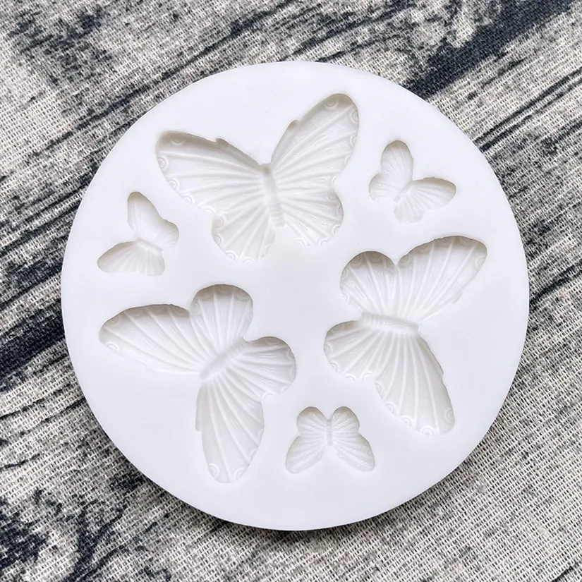 ৬প্রজাপতি সিলিকন ফনডেন্ট মোল্ড (সাদা) 6 Butterfly silicon fondent mould (white)